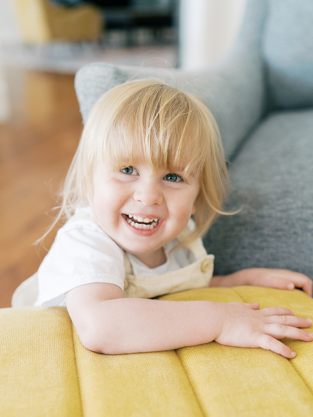 little girl during in-home lifestyle newborn session