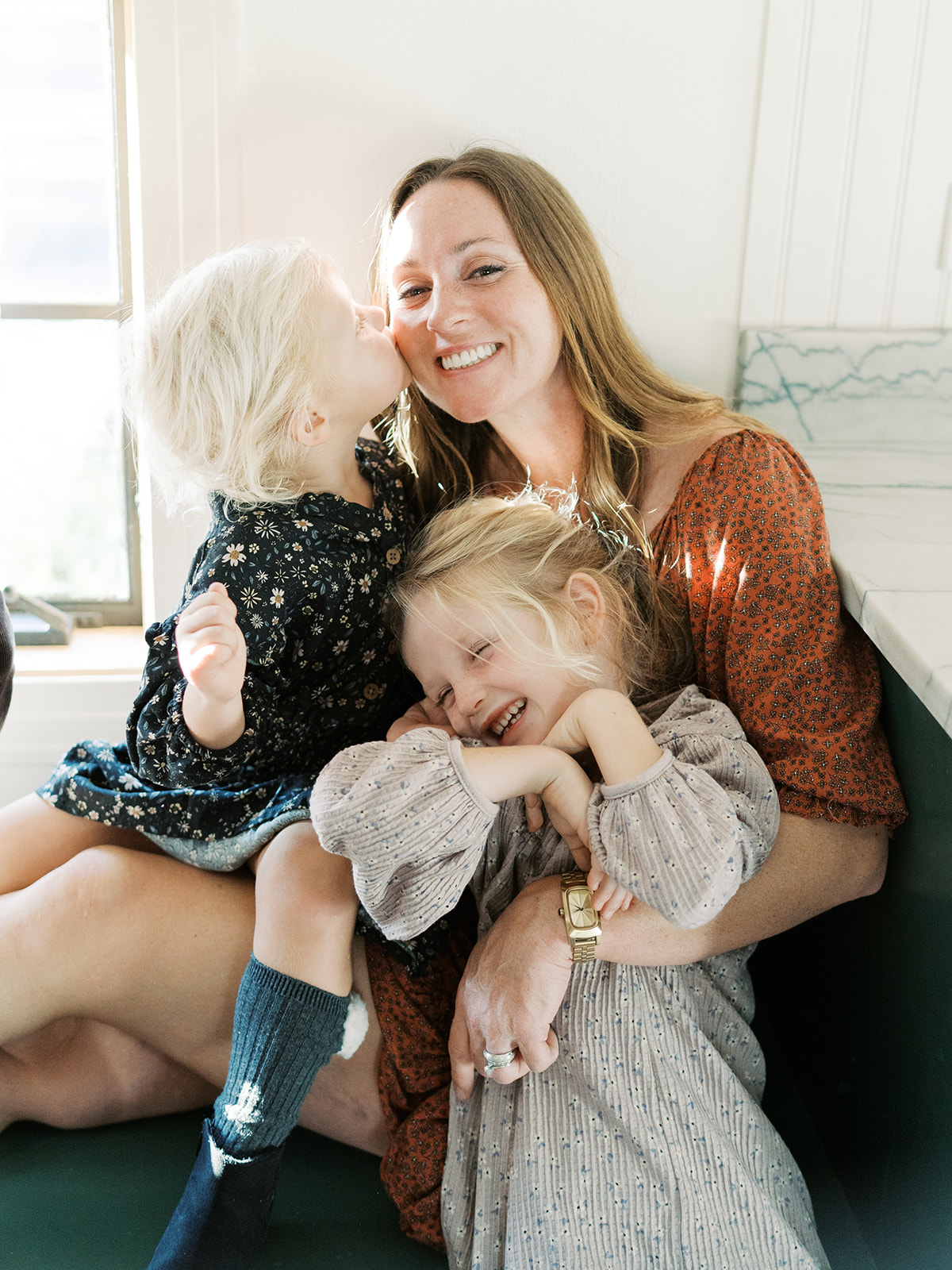 children kiss their mom's cheek | Why I'm No Longer Offering Mini Sessions | Full Family Sessions Create More Meaningful Photos