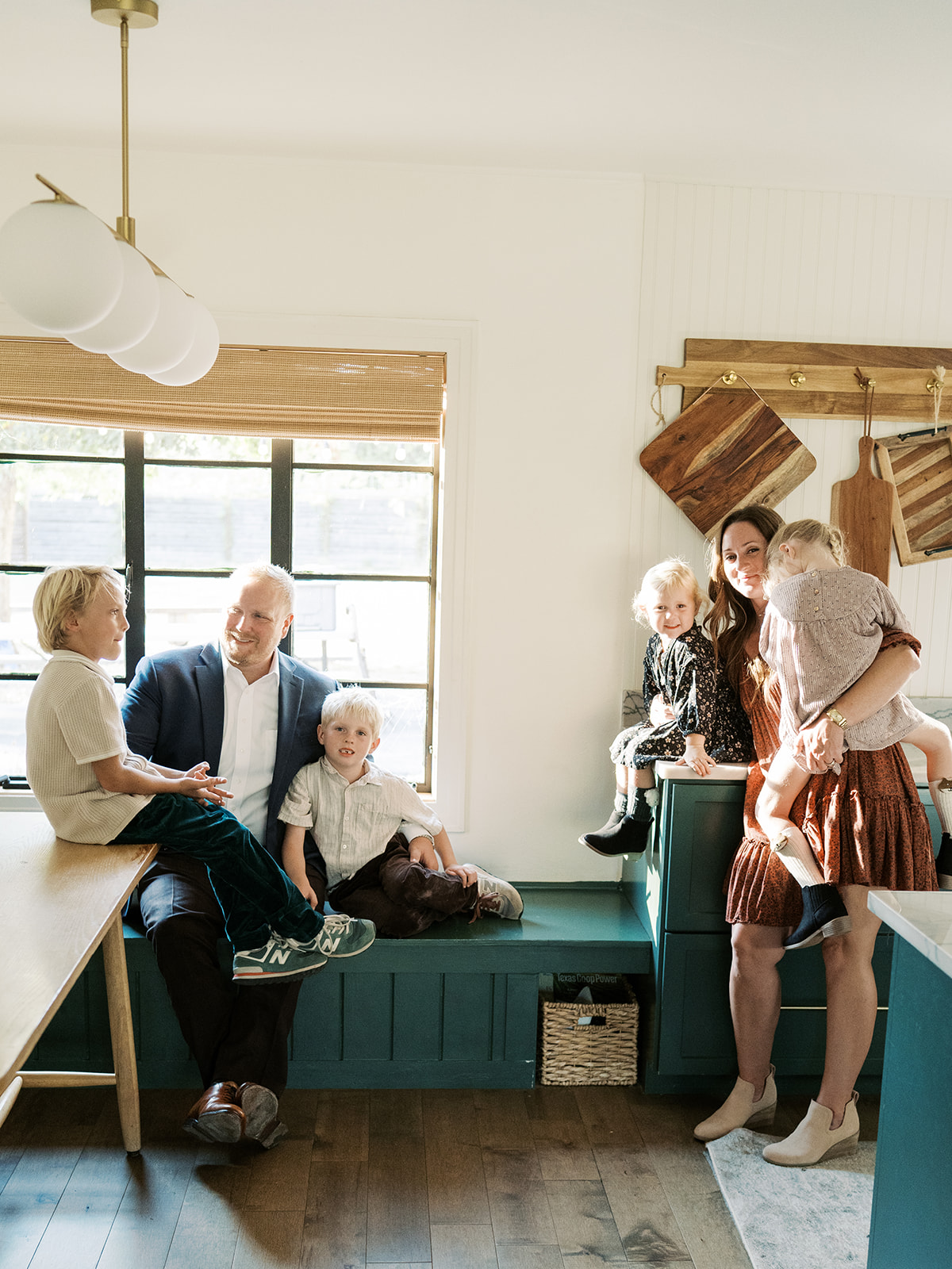 family in their kitchen during in-home family session | Why I'm No Longer Offering Mini Sessions | Full Family Sessions Create More Meaningful Photos
