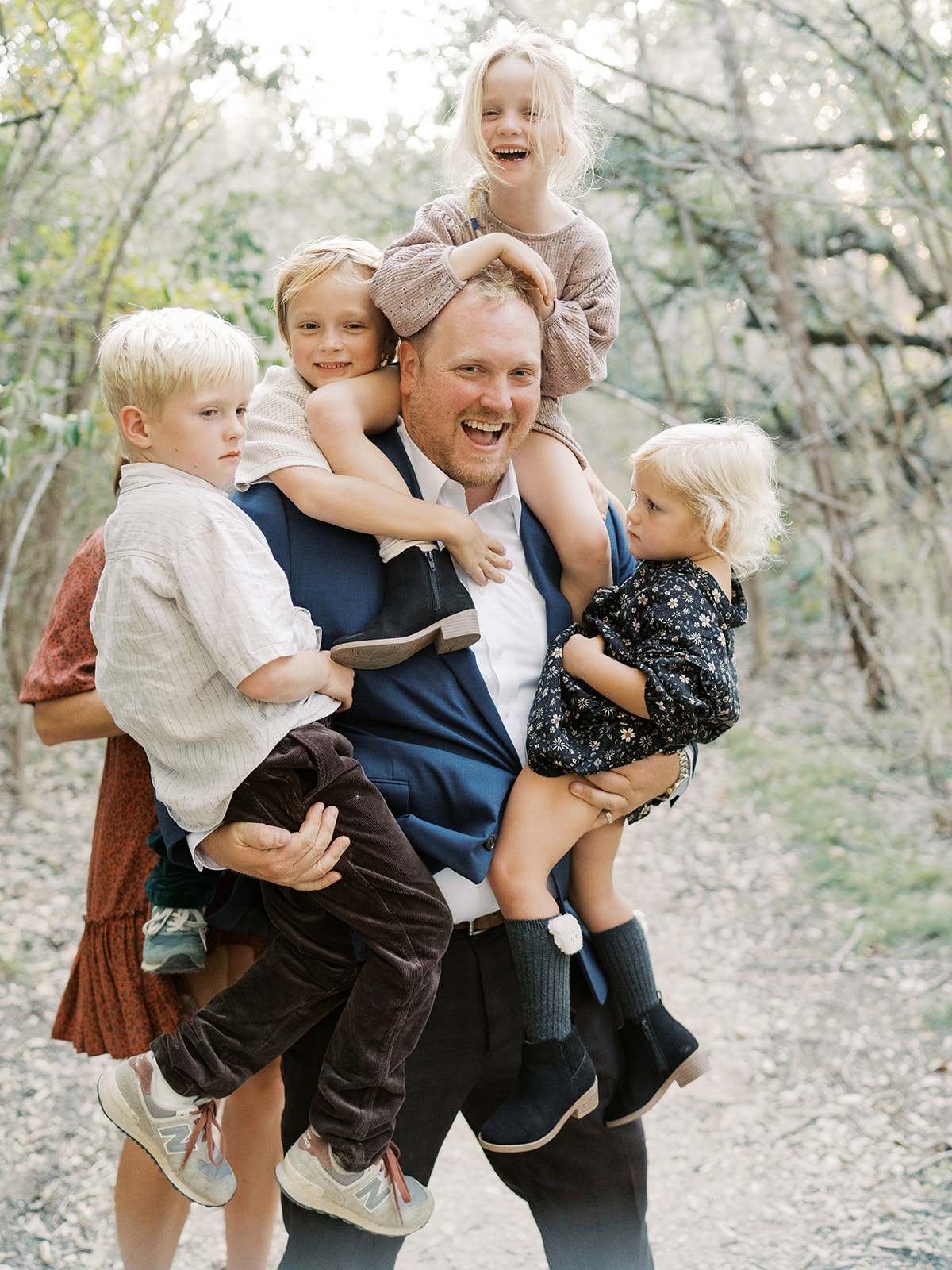 dad holding his children 